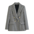 Blazer feminino de alfaiataria Elysium em tom neutro.