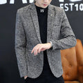 Blazer masculino slim em xadrez preto e branco.