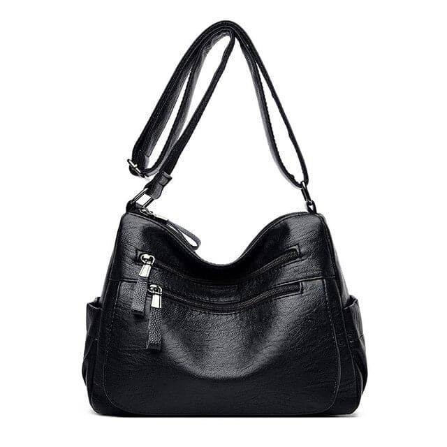 Alt text: Bolsa feminina de couro marrom da marca Loox elegante.