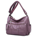 Alt text: Bolsa feminina de couro marrom da marca Loox elegante.