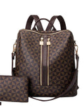 Alt text: Bolsa mochila feminina preta com detalhes geométricos em couro.