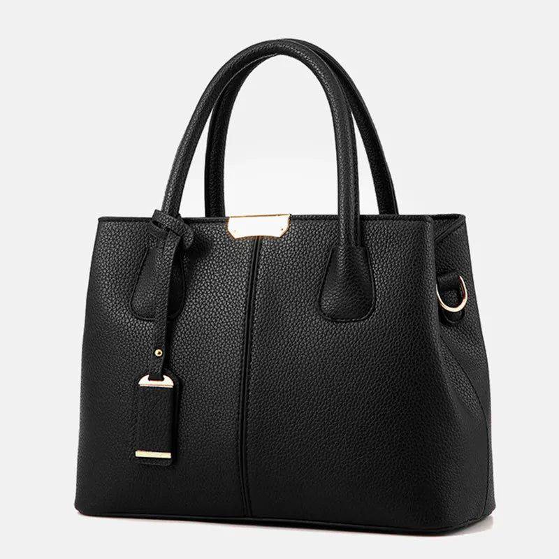Alt text: Bolsa Tote de Couro Feminina Eliza em tom neutro.