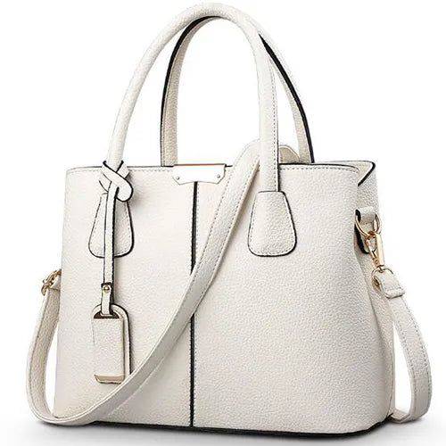 Alt text: Bolsa Tote de Couro Feminina Eliza em tom neutro.