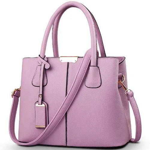 Alt text: Bolsa Tote de Couro Feminina Eliza em tom neutro.