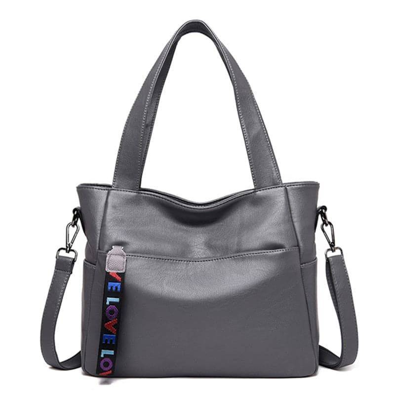 "Bolsa Tote de Couro Feminina Lara em tom neutro."