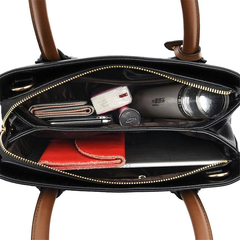 "Bolsa de Couro Feminina marrom com alça de mão elegante"