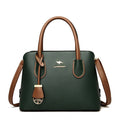 "Bolsa feminina de couro marrom com alça de mão elegante"