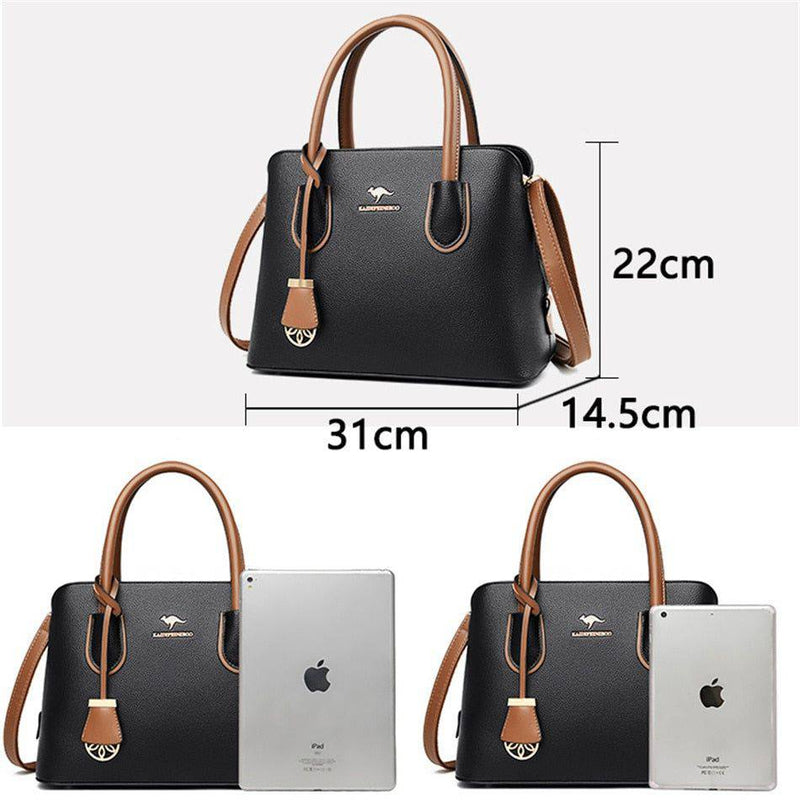 Alt text: Bolsa de couro feminina marrom com alça de mão elegante.