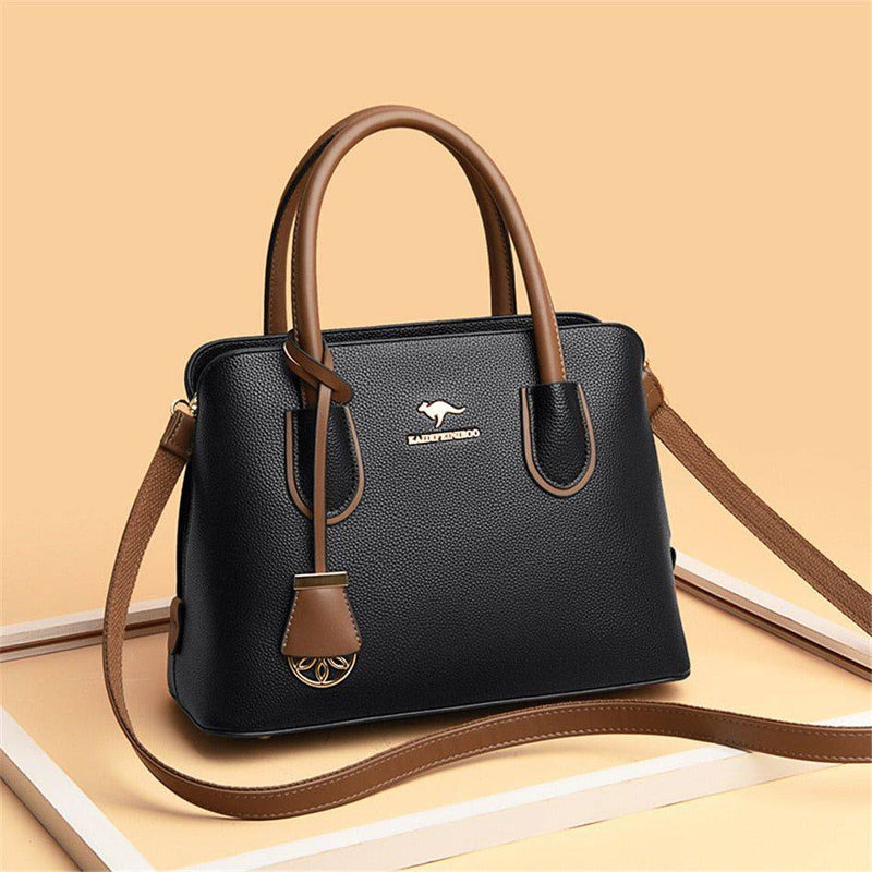 "Bolsa de Couro Feminina preta com alça de mão elegante"