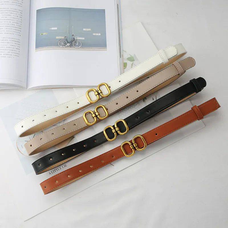 Alt text: Cinto de couro feminino executivo preto elegante e sofisticado.