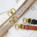 Quatro cintos de couro com fivelas de elo dourado em cores creme, bege, preto e marrom