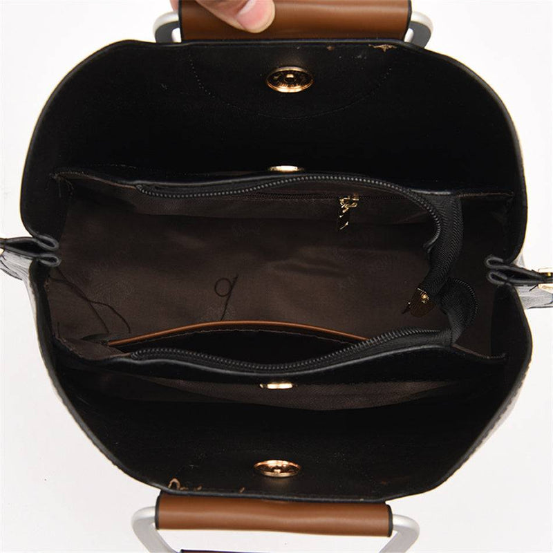 Alt text: Bolsa feminina de couro violeta elegante e sofisticada.