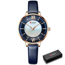 Relógio feminino com mostrador pérola, pulseira azul e caixa rosé gold