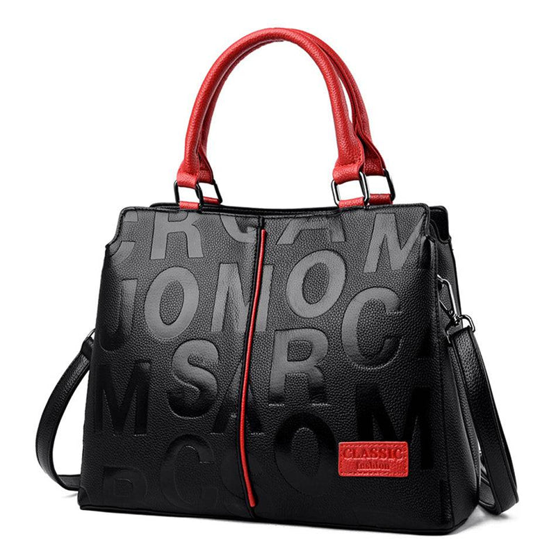 Alt text: Bolsa feminina de couro preto da marca Fiori Class.