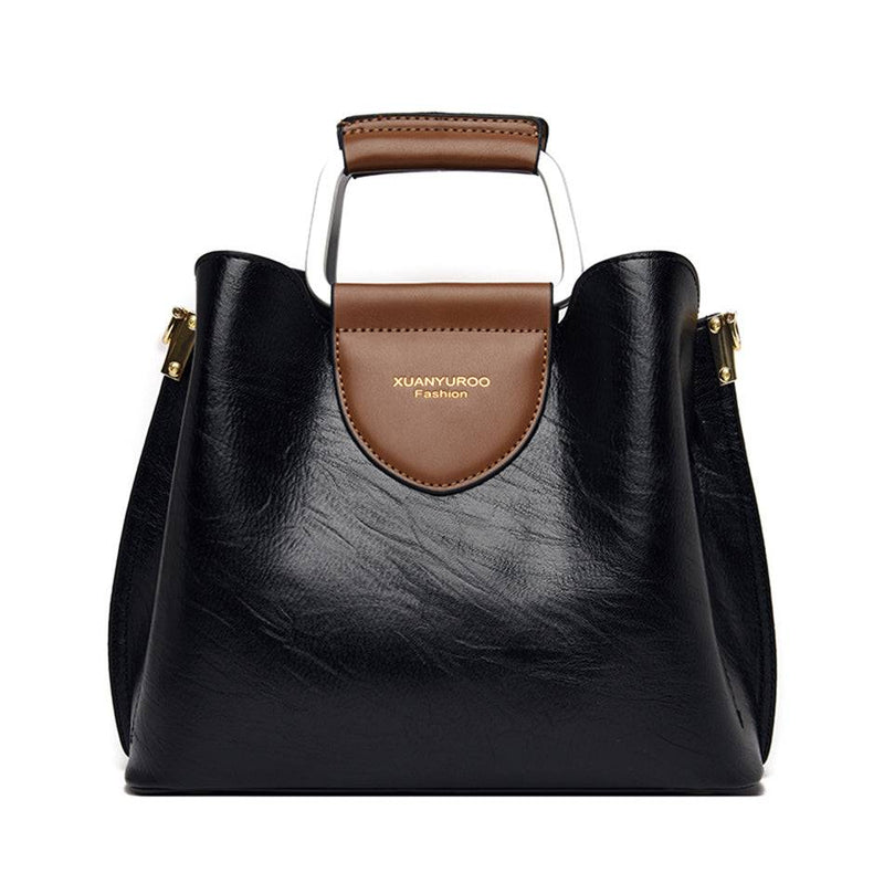 "Imagem de Bolsa Feminina de Couro Violeta, elegante e sofisticada."