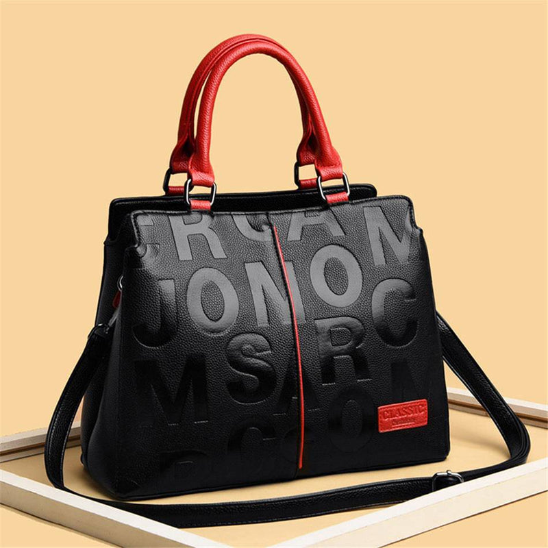 Alt text: Bolsa feminina de couro preto da marca Fiori Class.