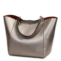 Alt text: Bolsa feminina de couro preta estilo tote elegante.