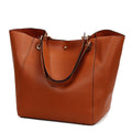 Alt text: Bolsa feminina de couro preta estilo tote elegante.