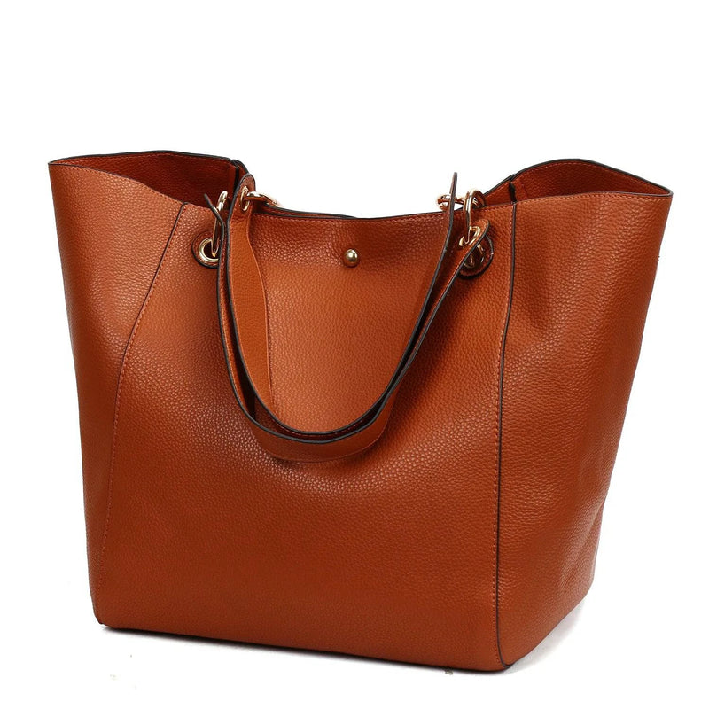 Alt text: Bolsa feminina de couro preta estilo tote elegante.