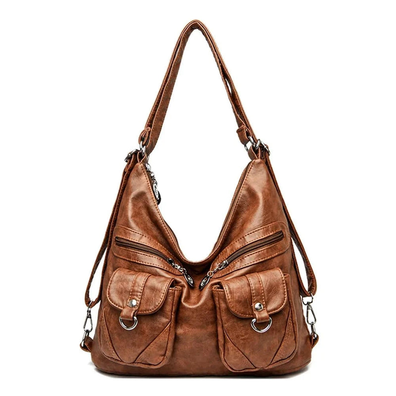 Alt text: Bolsa feminina de couro genuíno Prestige em tom neutro.