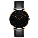 Relógio Hannah Martin com caixa rose gold, mostrador preto e pulseira de couro preta