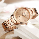 Relógio feminino dourado rose com pulseira de elo em aço inox