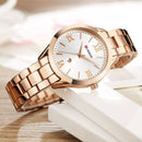 Relógio feminino com pulseira e mostrador de aço dourado, números romanos e design minimalista