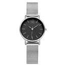 Relógio feminino SK Slim com pulseira de malha prateada e mostrador preto