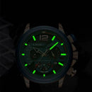 Relógio Lige cronógrafo com mostrador preto, marcadores e ponteiros luminosos verde neon, pulseira de couro