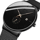 Relógio de aço inox preto com pulseira mesh, mostrador minimalista e calendário