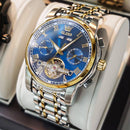 Relógio masculino aço e dourado com mostrador azul, cronógrafo e tourbillon