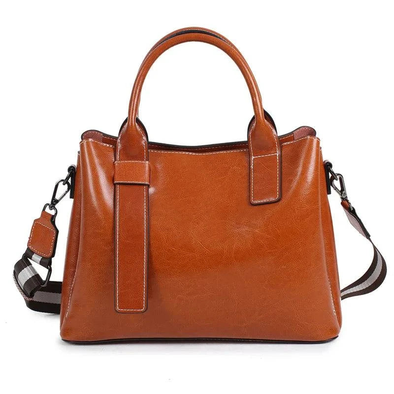 Alt text: Bolsa feminina tote em couro genuíno glam marrom.