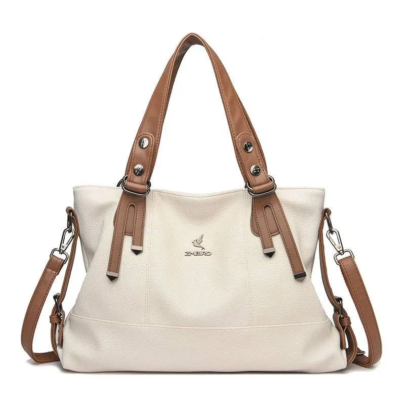 "Bolsa feminina de mão em couro genuíno marrom elegante."
