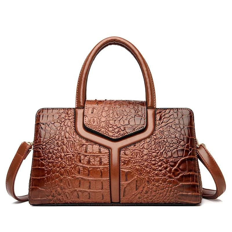 Alt text: Bolsa Satchel Feminina de Couro Elisium em tom neutro.