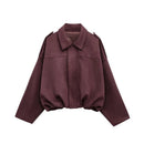 Jaqueta bomber feminina oversized de camurça com gola camisa e zíper Zellum