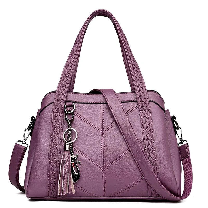 Bolsa Tote estruturada marrom com alça adicional em couro.
