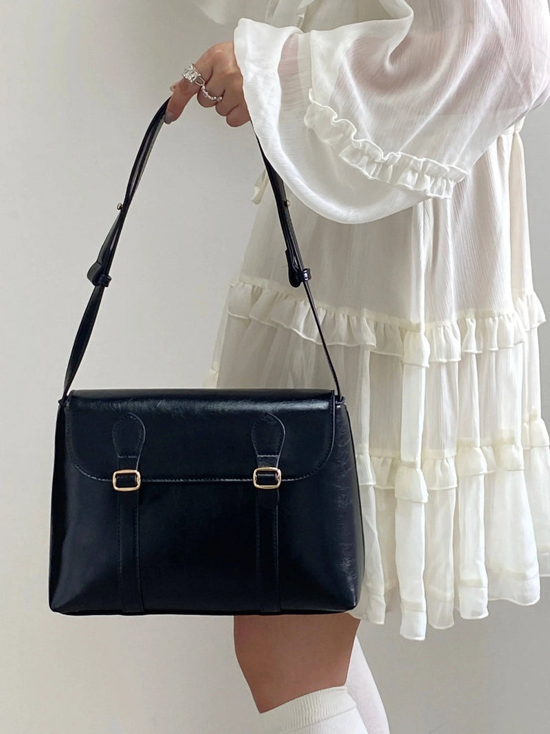 Alt text: Bolsa Satchel Feminina em Couro Marrom Claro com Alça Longa.