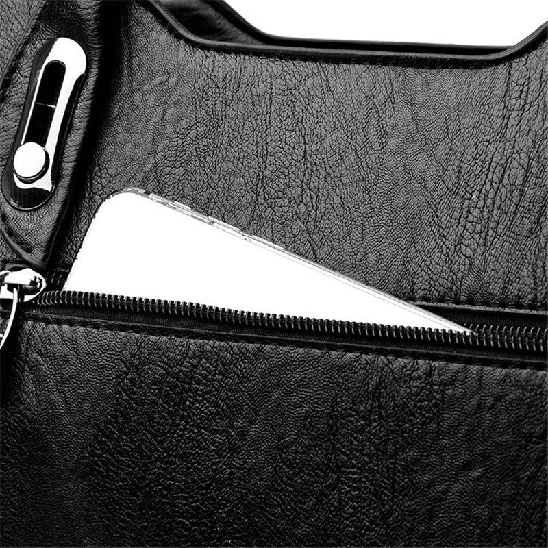 Bolsa feminina de couro crossbody marrom com alças duplas.
