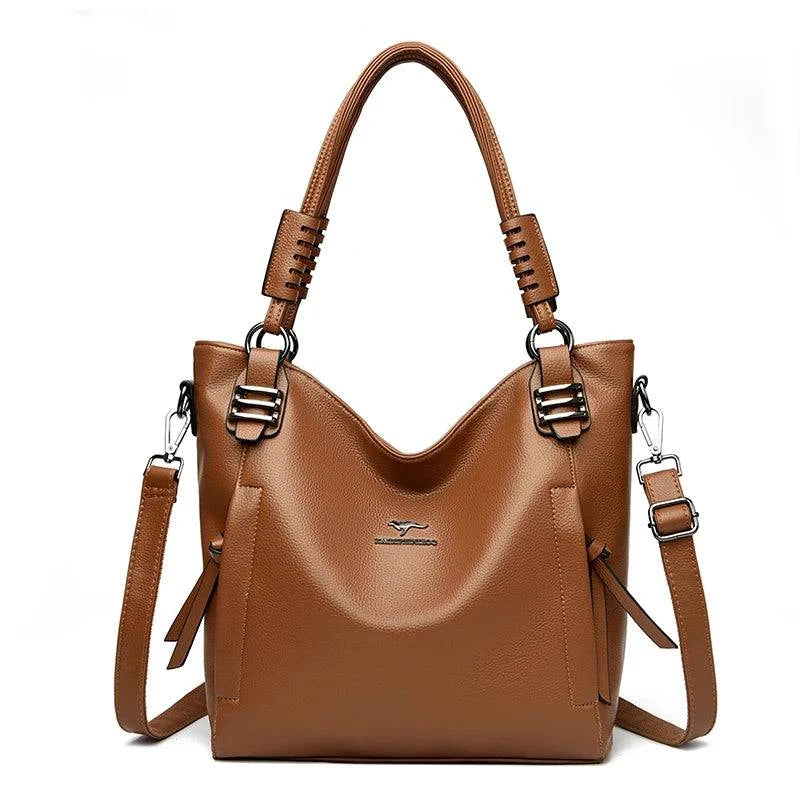 Alt text: Bolsa feminina de couro tote preta com alça dupla elegante.