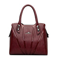 Bolsa feminina de couro crossbody preta com alças duplas.
