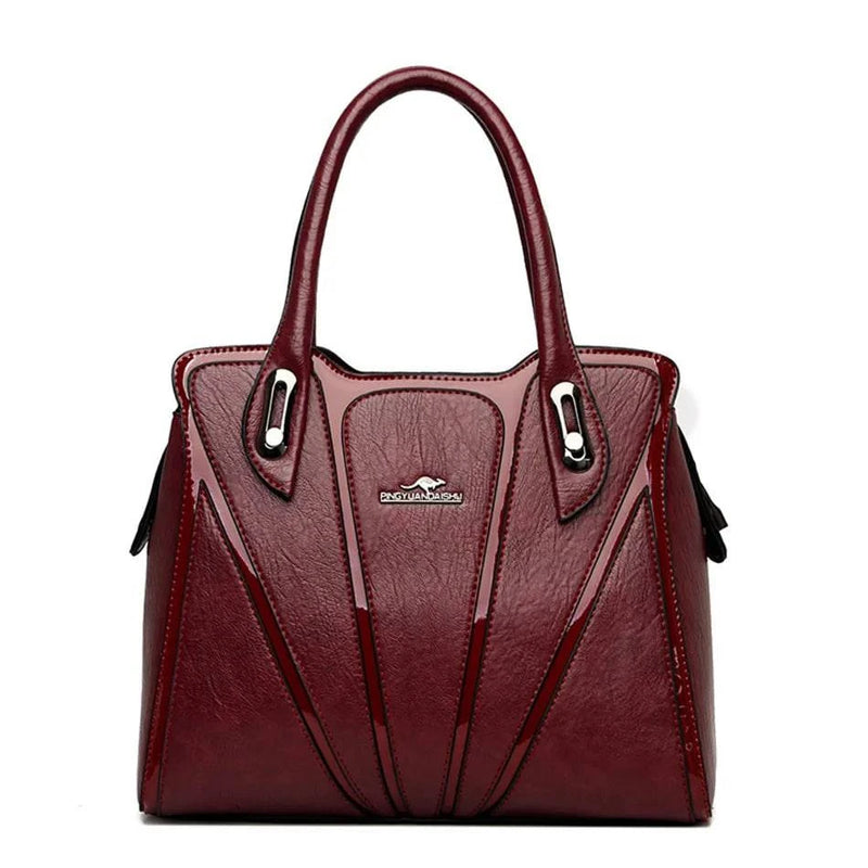 Bolsa feminina de couro crossbody preta com alças duplas.
