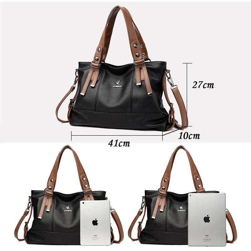 "Bolsa feminina de mão em couro genuíno marrom elegante"