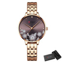 Relógio feminino analógico com mostrador floral, caixa e pulseira em ouro rosado