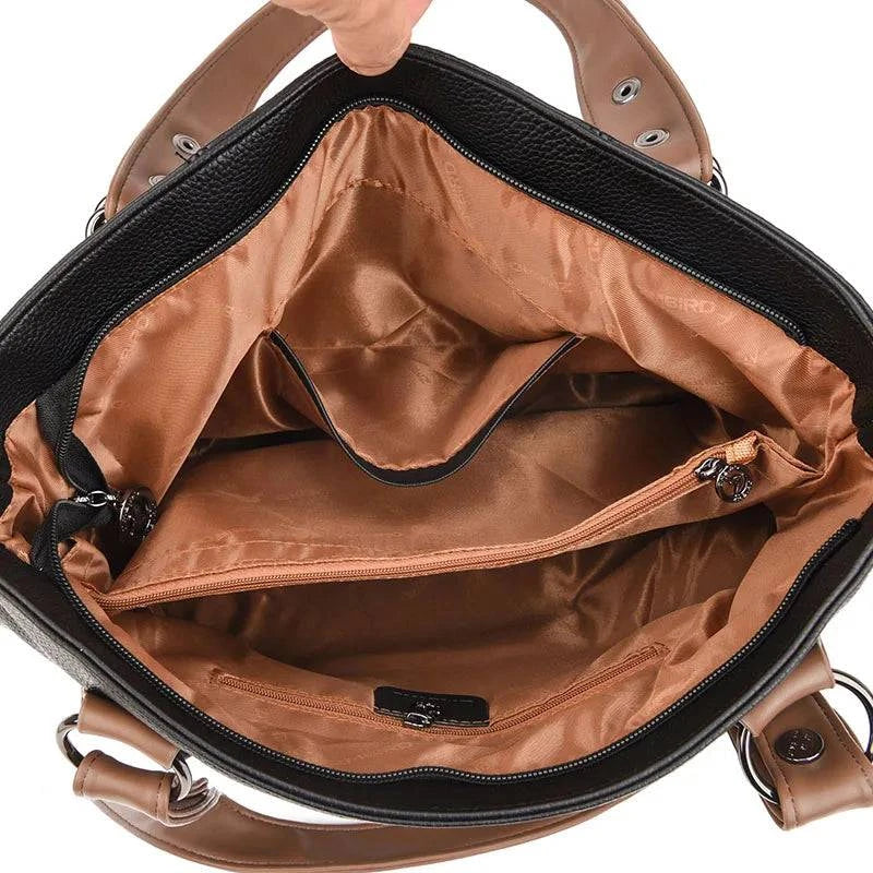 Bolsa feminina de mão em couro genuíno marrom elegante.