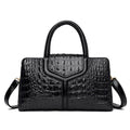 Alt text: Bolsa Satchel feminina de couro Elisium em tom neutro.