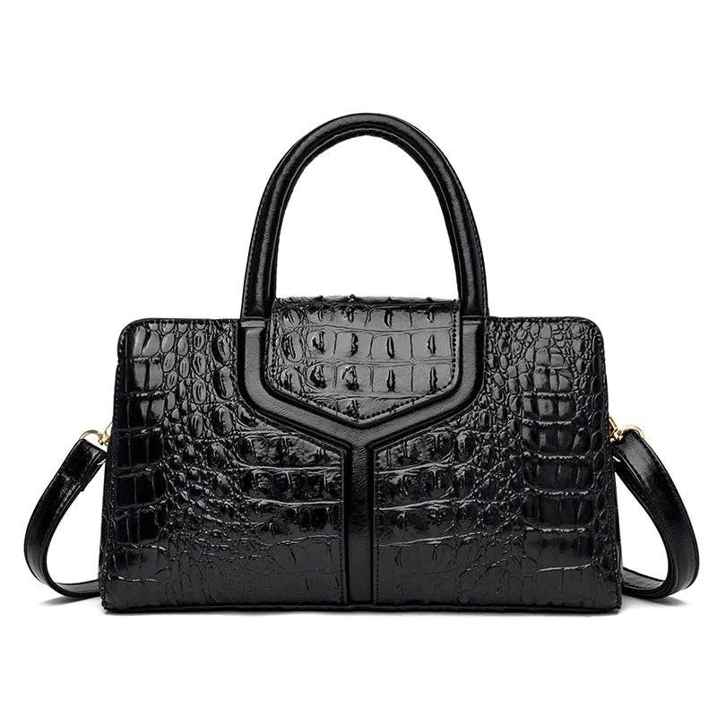 Alt text: Bolsa Satchel feminina de couro Elisium em tom neutro.