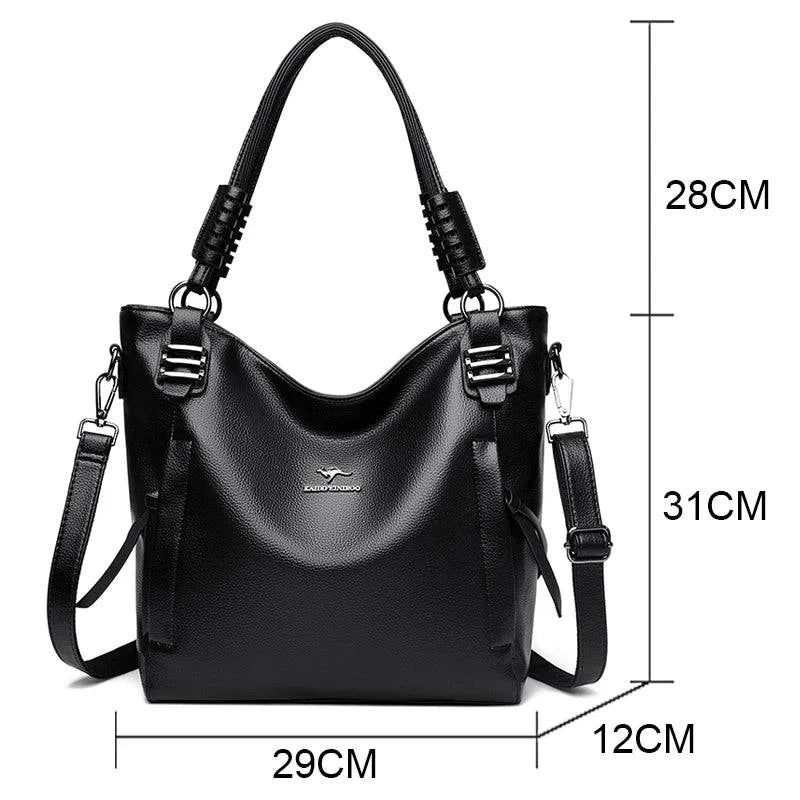 Alt text: Bolsa feminina de couro tote preta com alça dupla elegante.