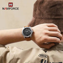 Relógio NaviForce com mostrador escuro e pulseira de couro marrom no pulso