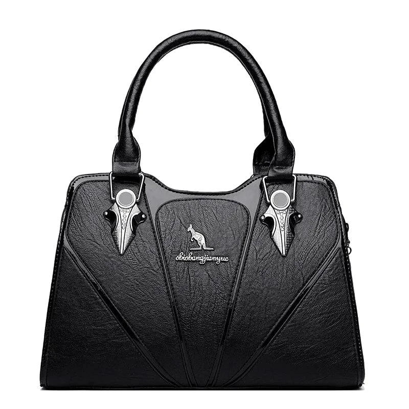 Alt text: Bolsa feminina de couro Monarque em tom marrom elegante.