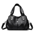 Alt text: Bolsa feminina de couro legítimo marrom com alça dupla elegante.
